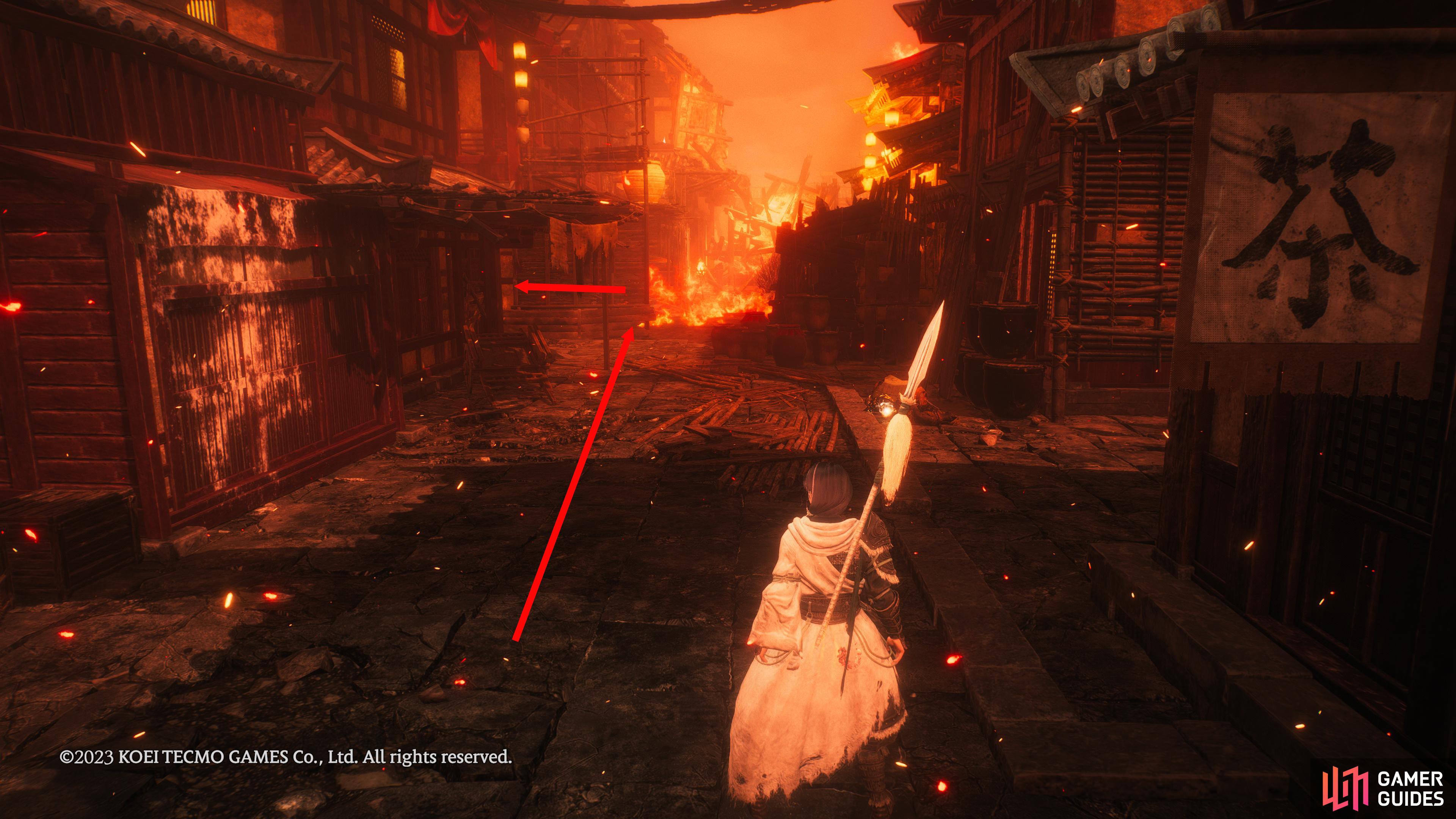 From the Battle Flag in the center of town. Walk towards the flames, and turn left into the next area.