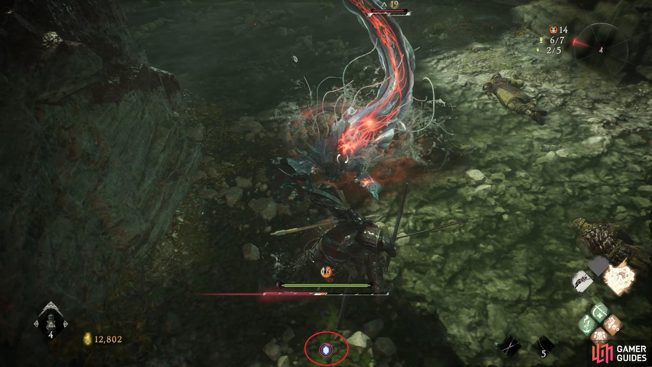 You can see a status effect shown for the player at the bottom of the screen, circled in red.