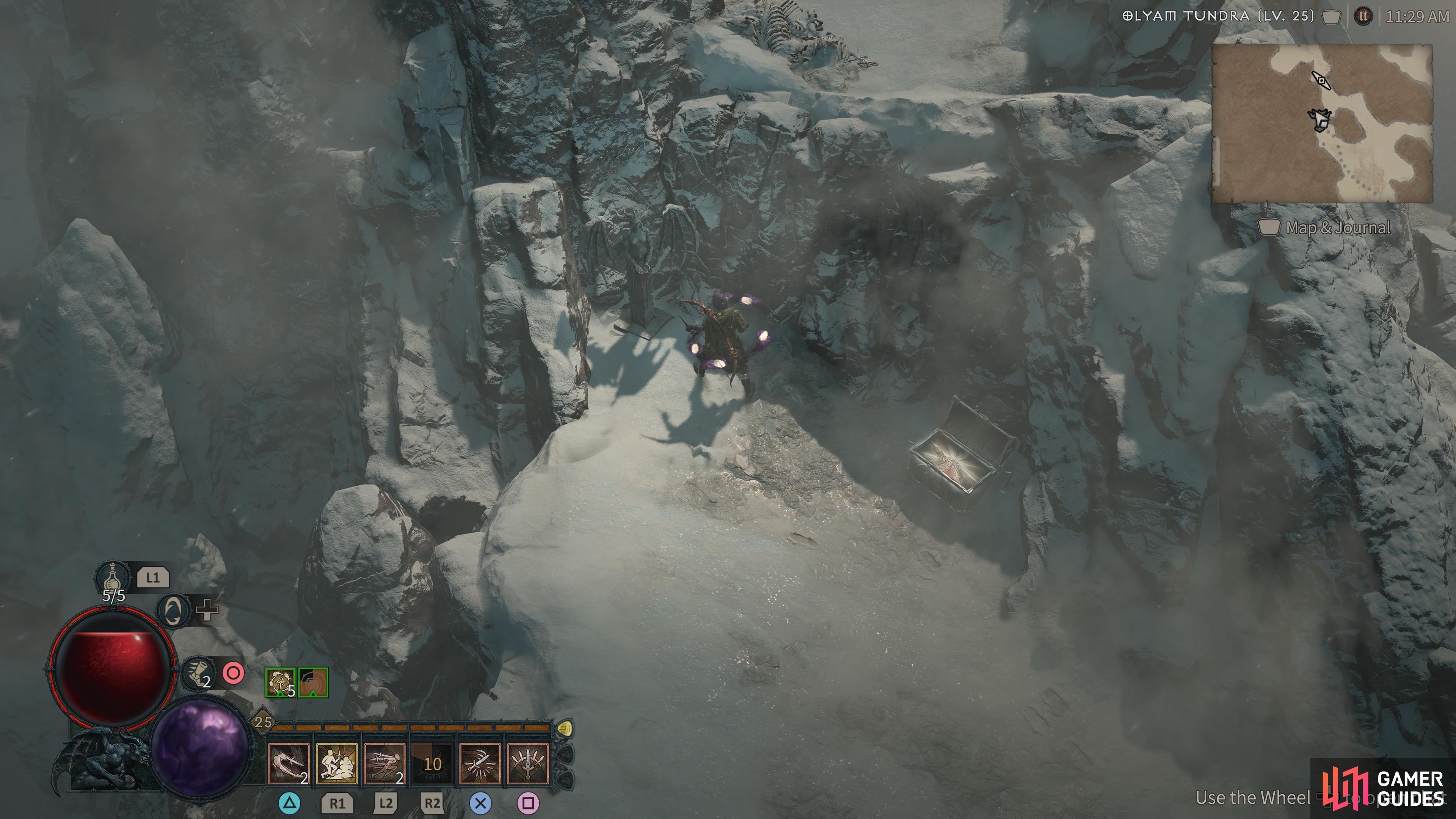go down the snowy path to find the statue.