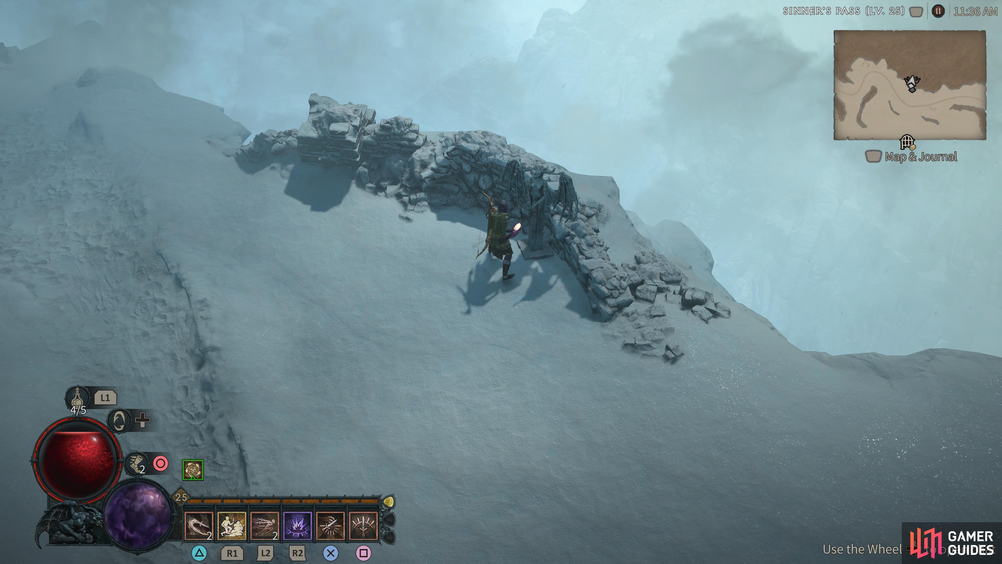 another statue that overlooks a cliff.