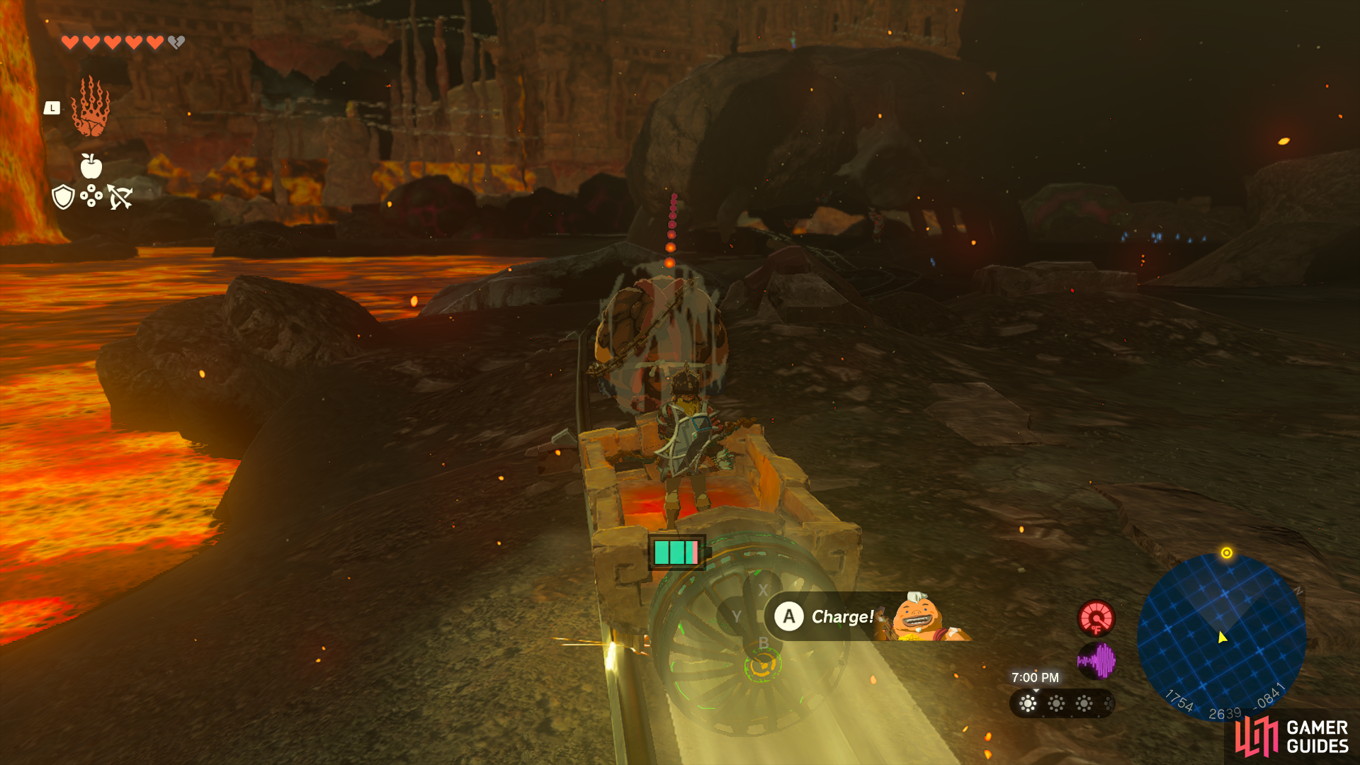 Ride the cart to the Fire Temple while using Yunobo to attack enemies.