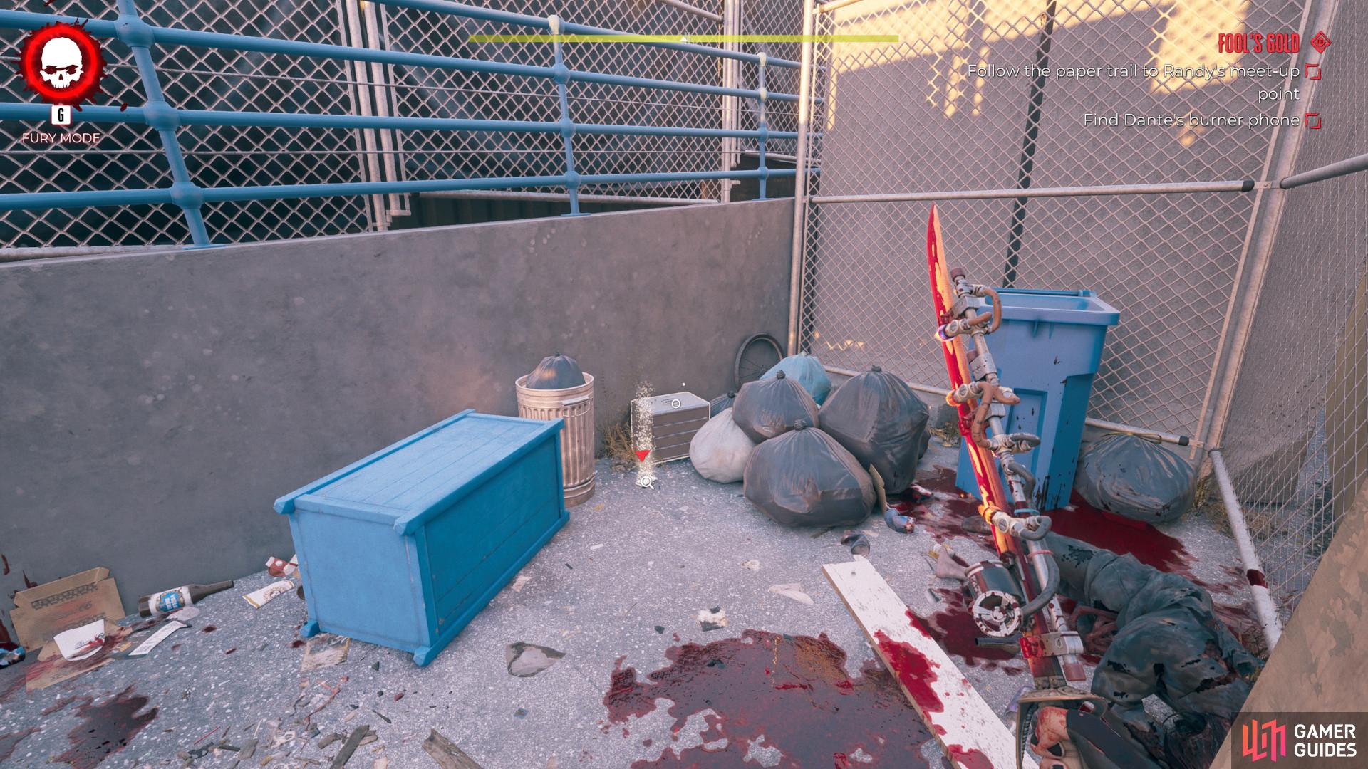 The first burner phone is beside the Luigi's Pizzeria dumpster alleyway.