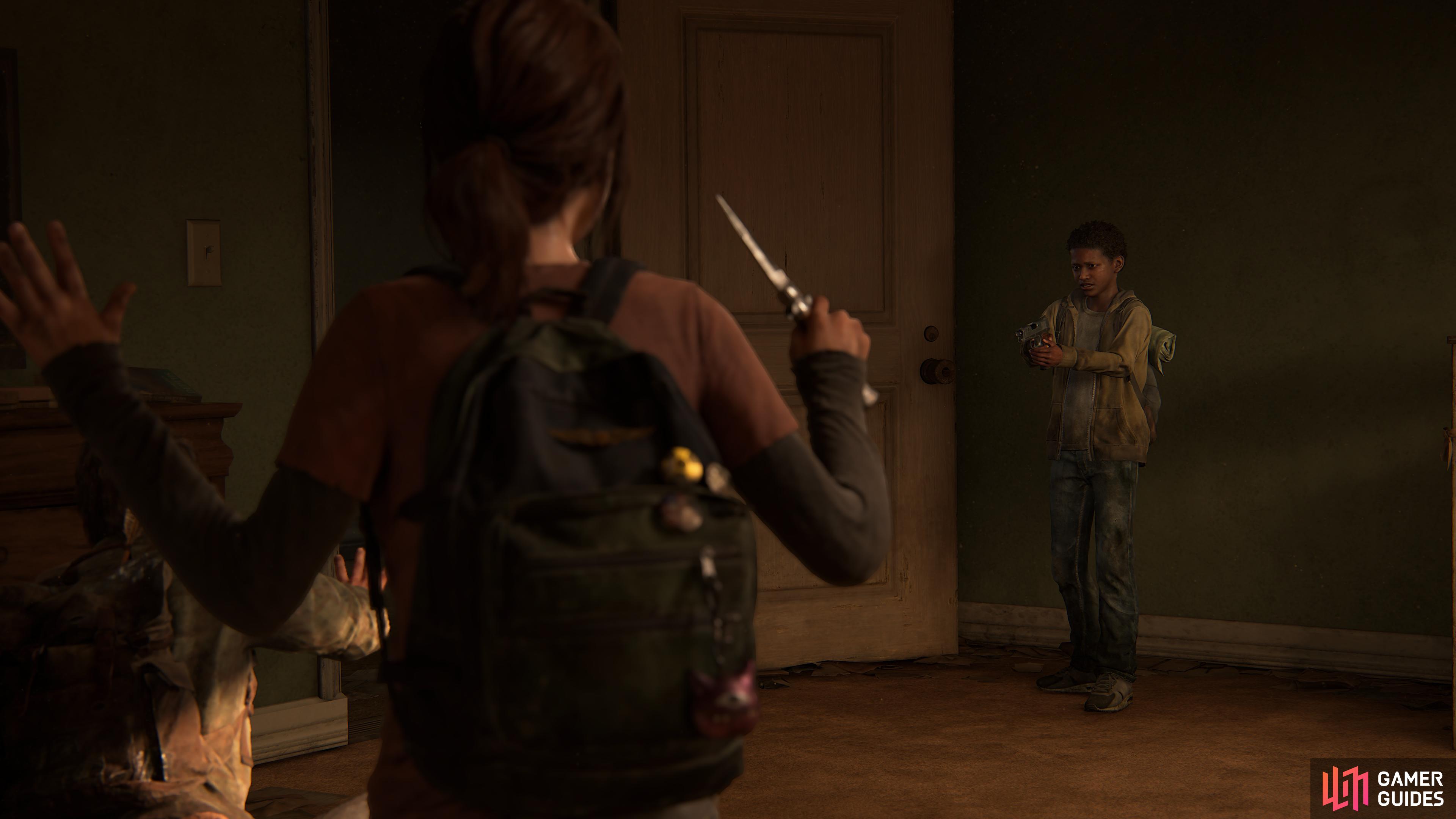 Ellie and Joel find themselves held at gunpoint.
