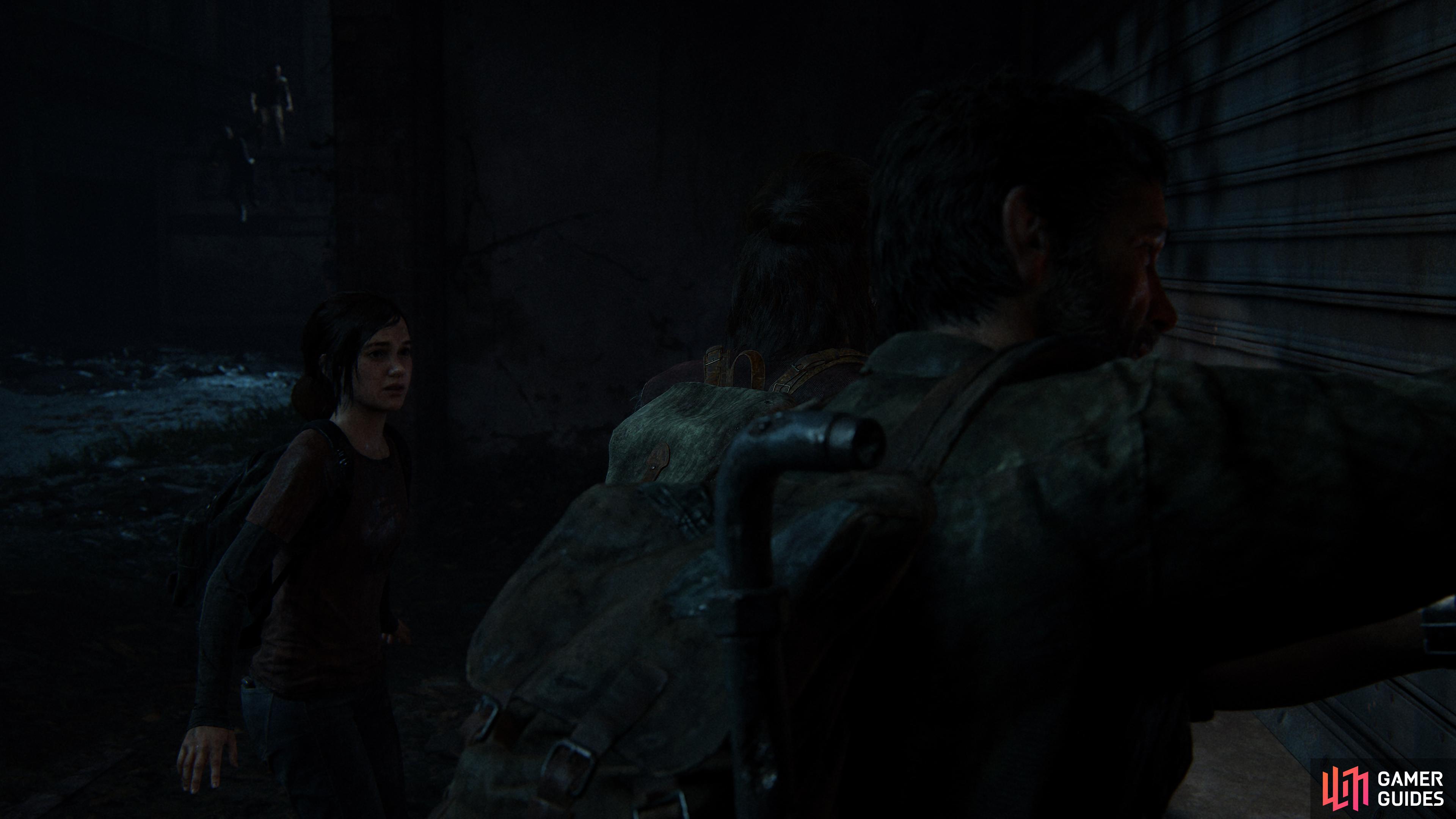 Joel, Ellie and Tess make their way into the Museum. 