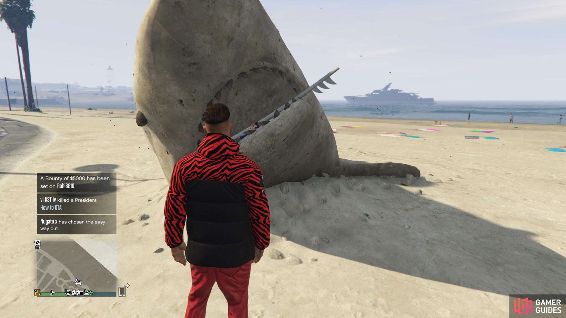 to find the action figure sitting in the mouth of the shark sculpture. 