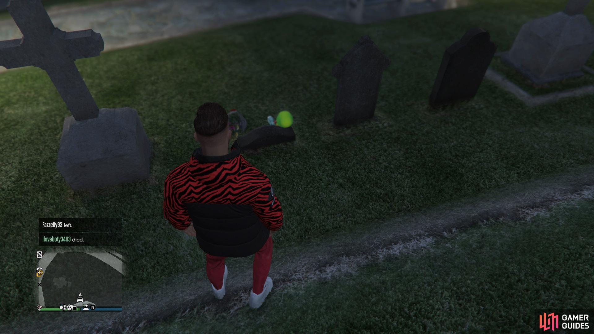 to find the action figure sitting on a grave.