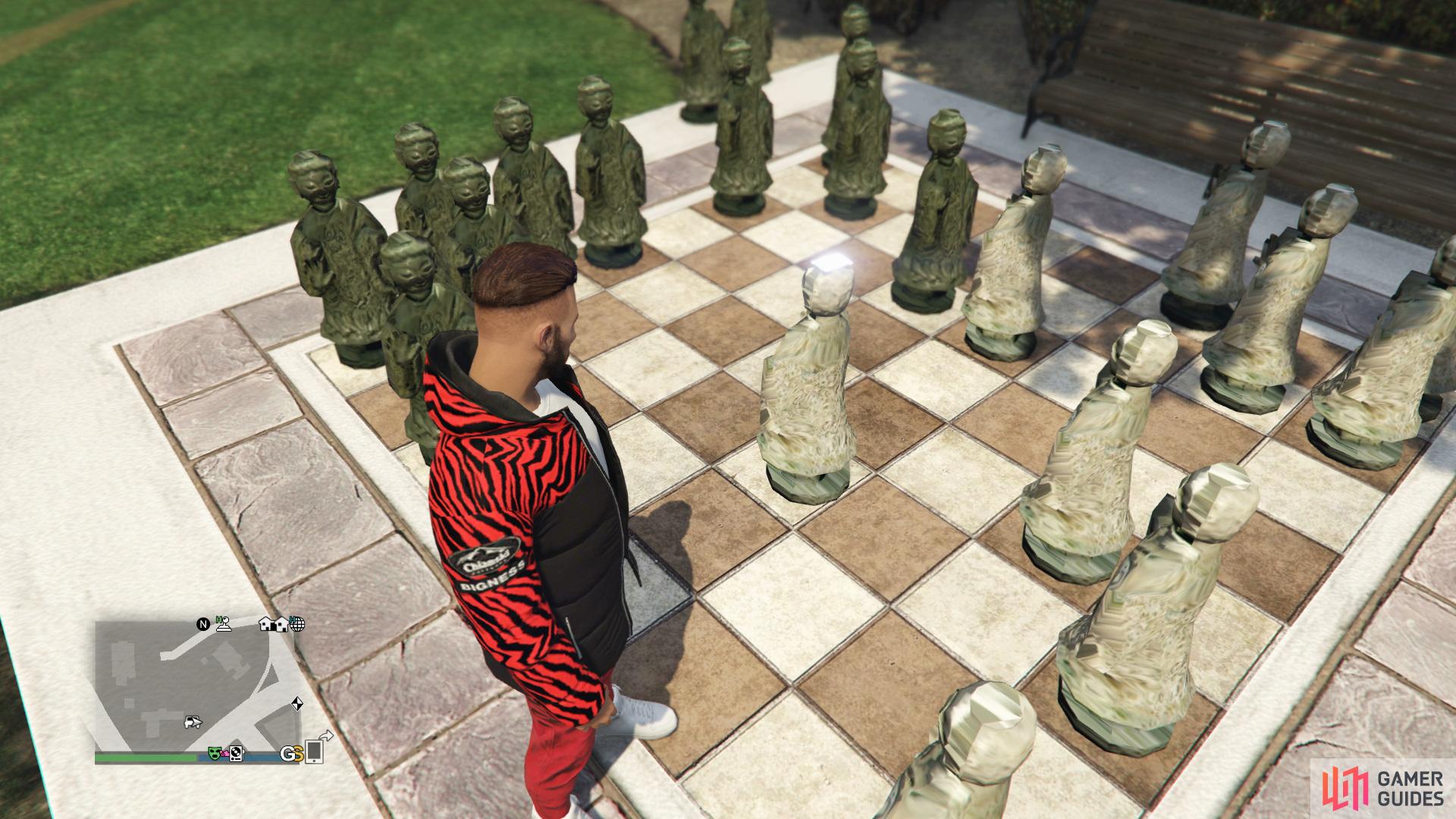 to find the Playing Card sitting on a chess piece.