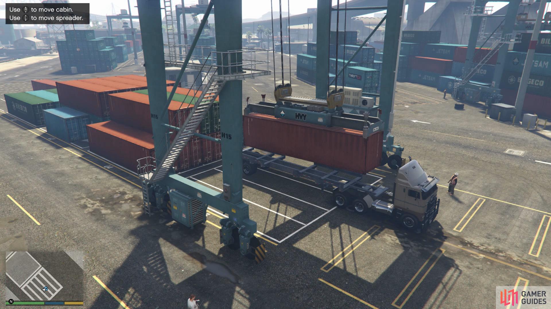 then load up two trucks with containers via the  crane.