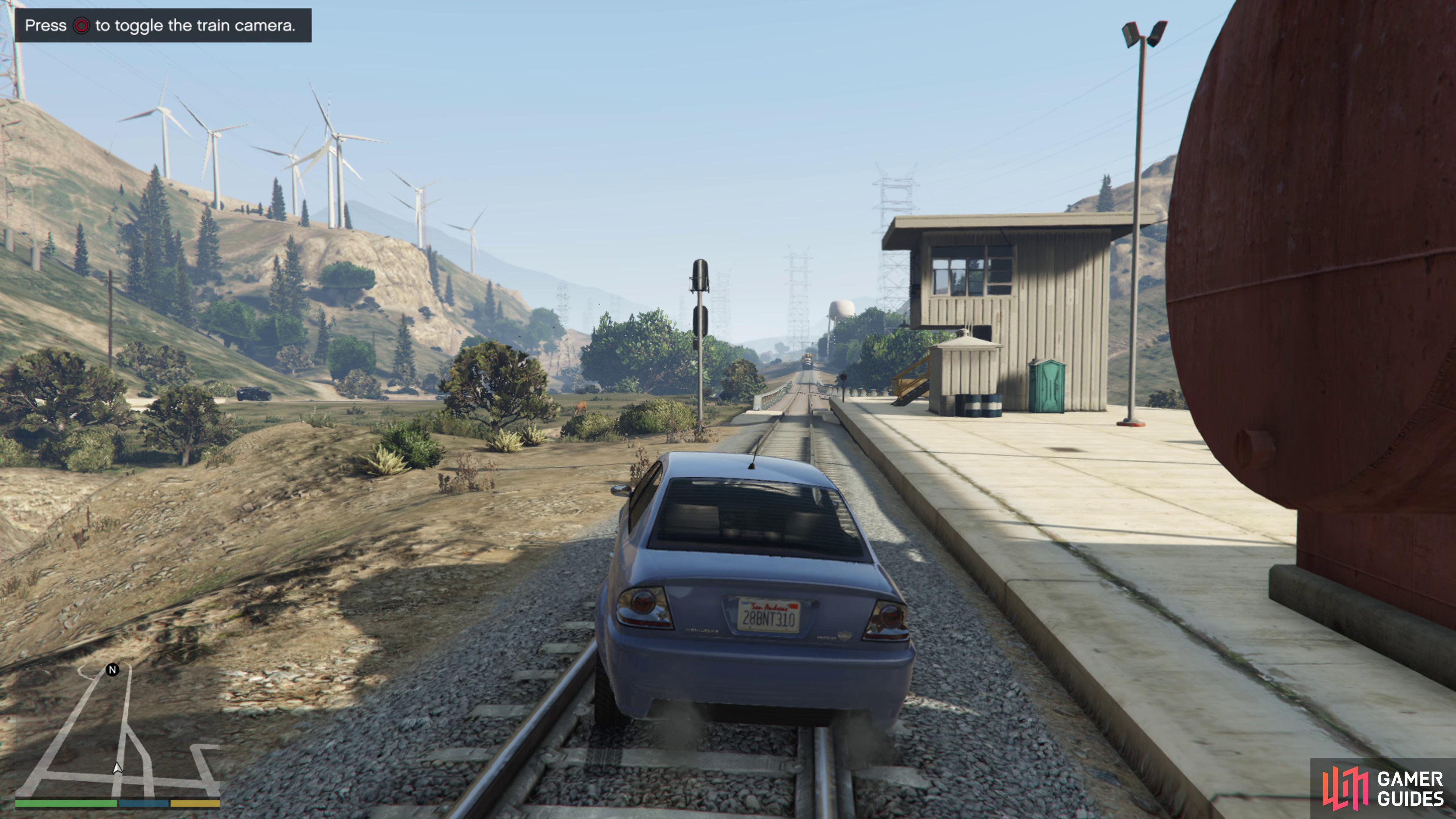 Park the car on the tracks and wait for the train to approach