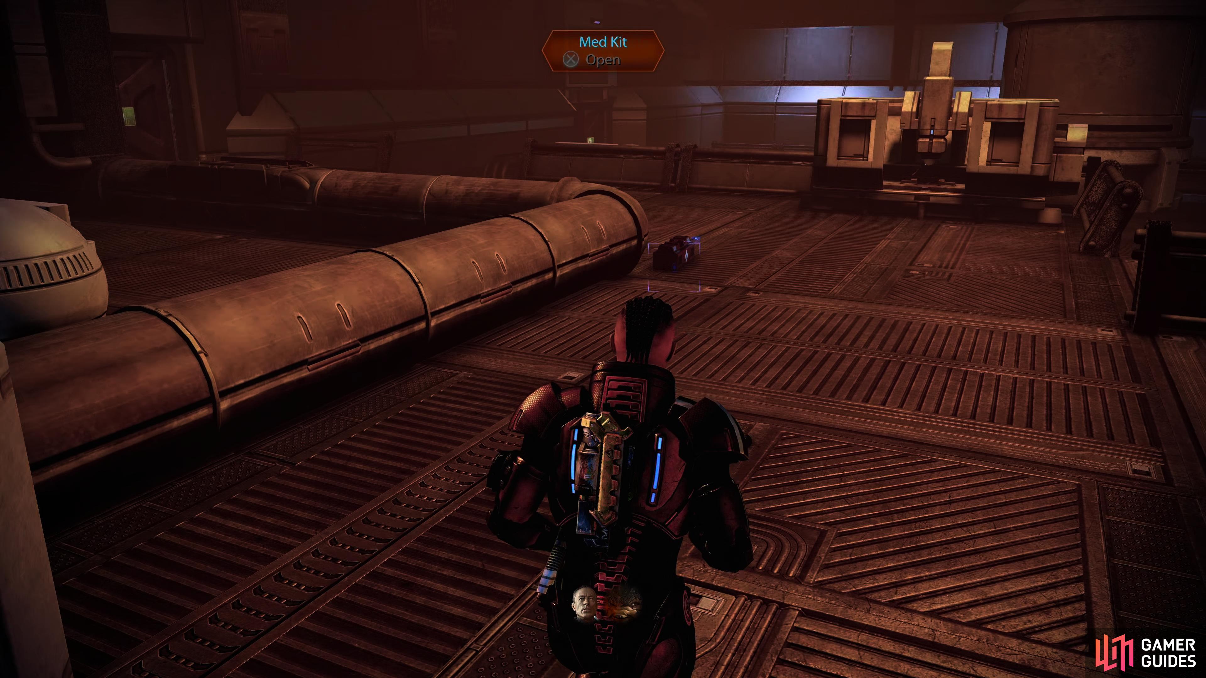 After the battle has ended, pick up the Med-Kit in the center of the room