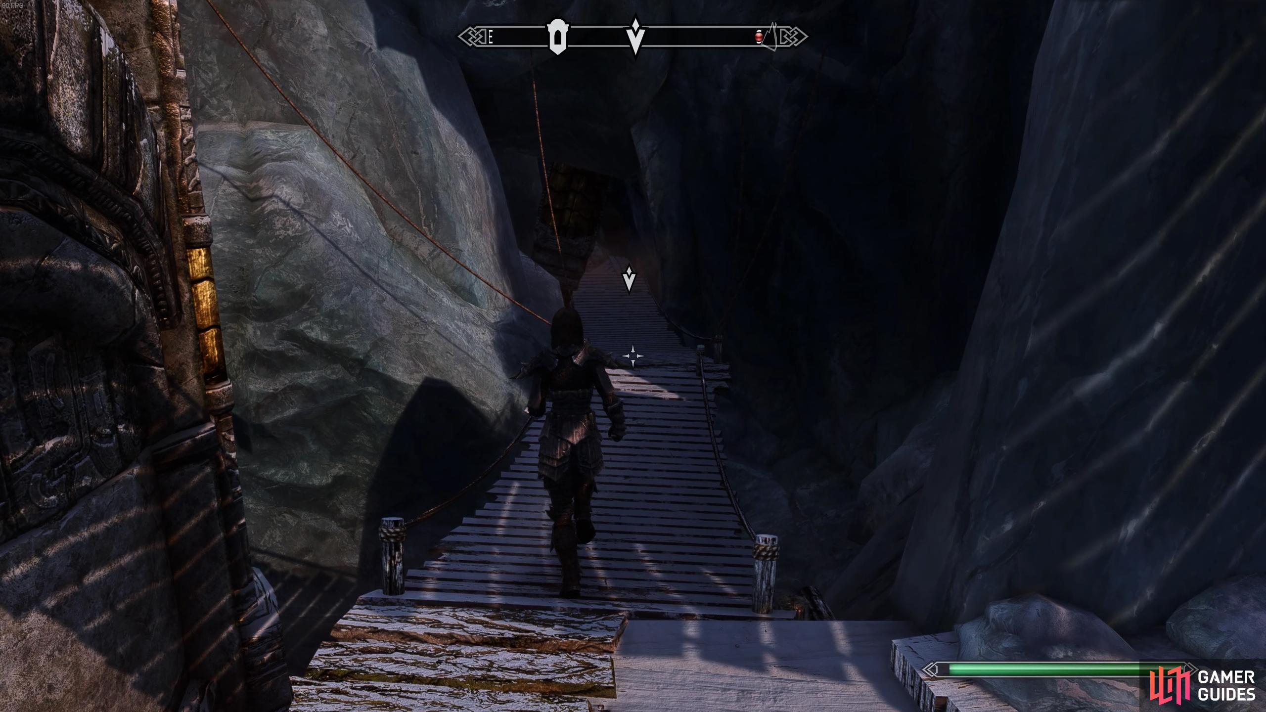 You can enter Alftand from the cave at the bottom of the wooden platforms.