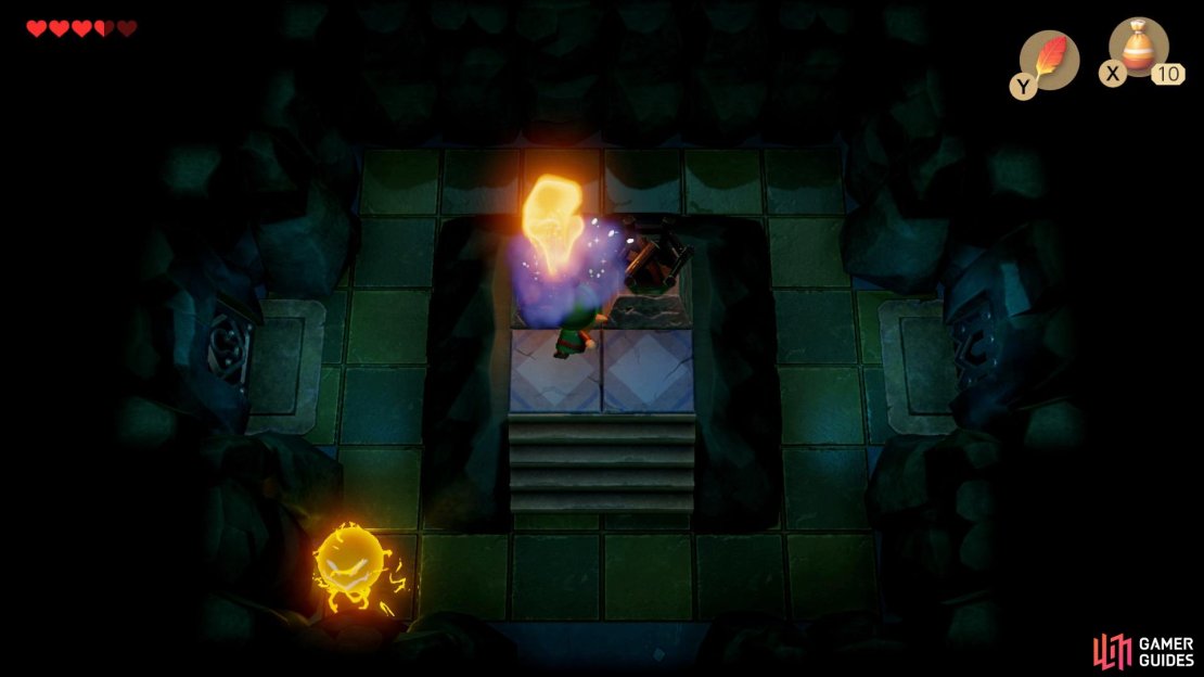 Head north from the first room in the cave and light the torches with your Magic Powder,