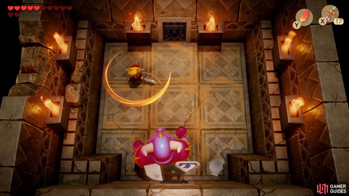 Take out the large guard by hitting him with your Boomerang, 