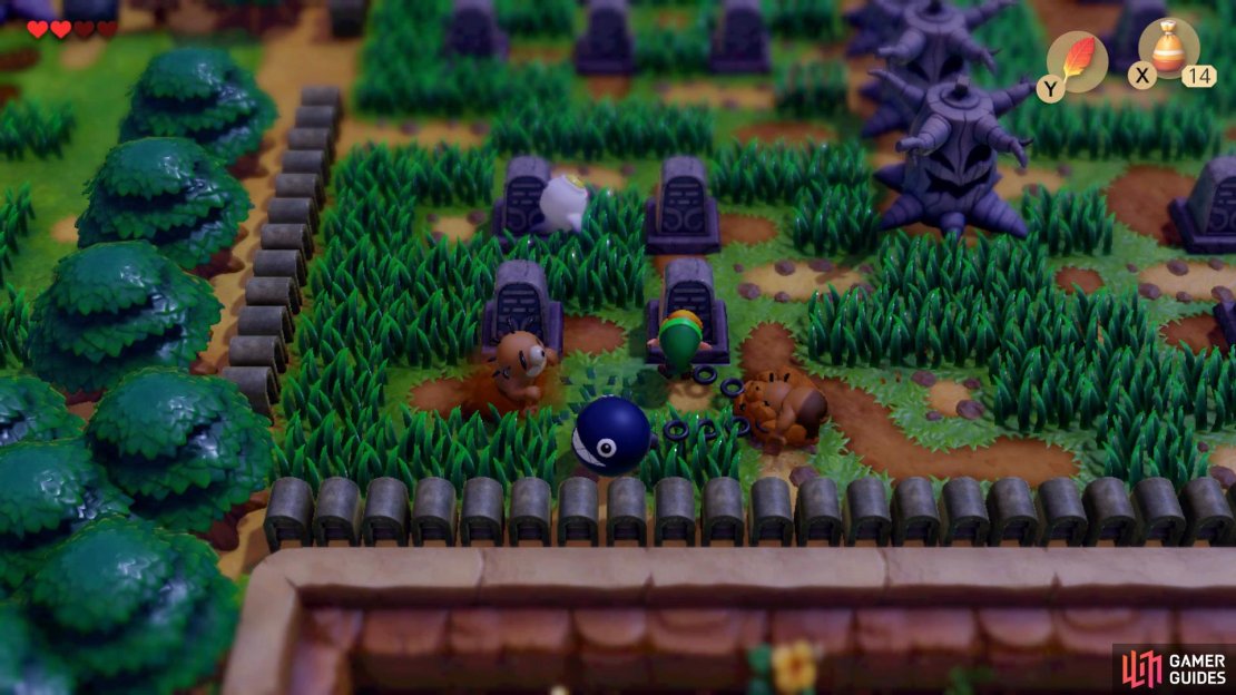 Head down to the Cemetery and push the bottom right Gravestone to reveal a hidden staircase, 