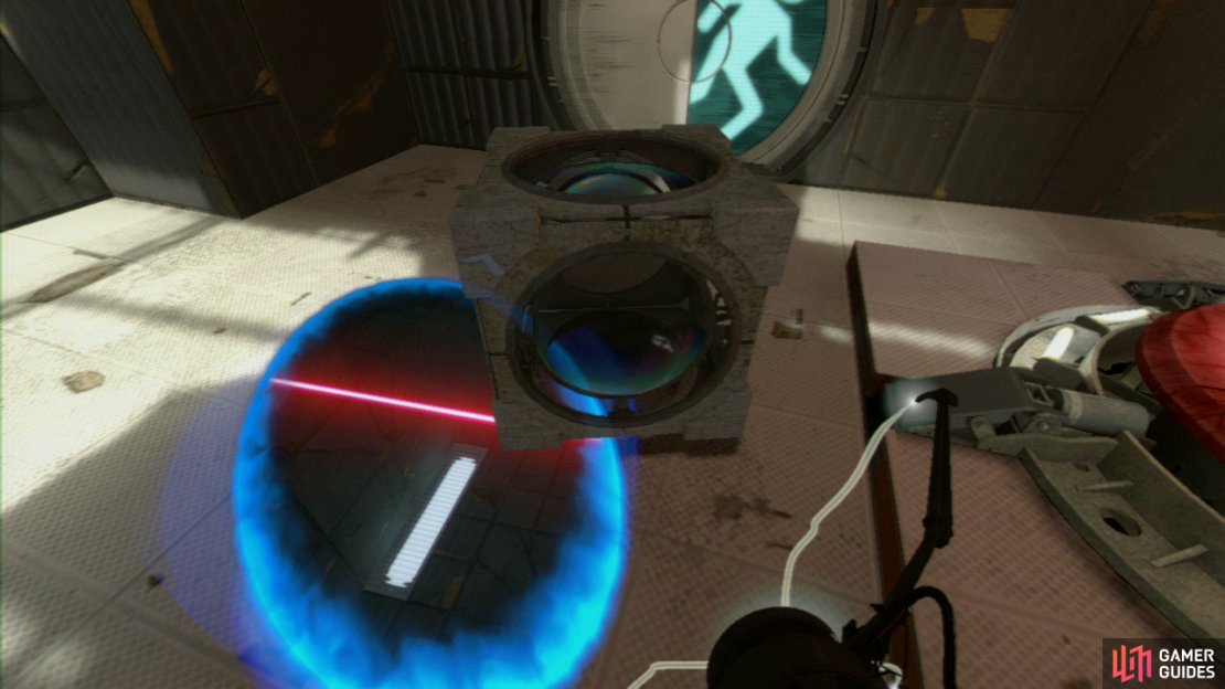 Place a portal here and then turn around and look at the Displacement Cube, place your second portal here and it’ll appear near you, so turn around, pick it up and drop it on the red button to open the exit.