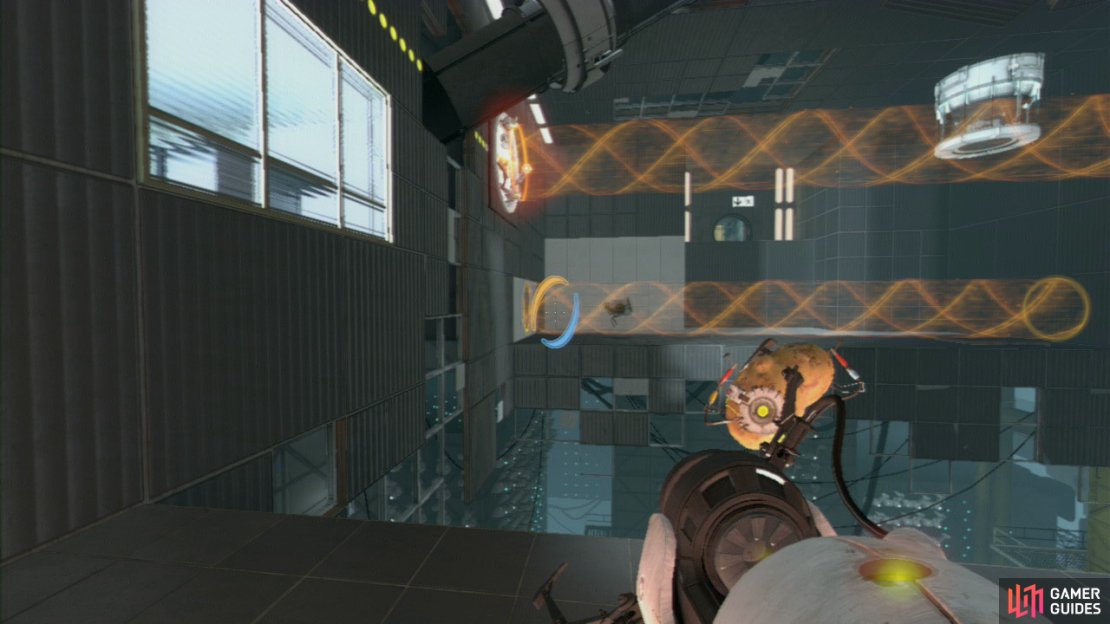 This’ll cause the transport beam to pick the Cube up, now stand on the red switch and this’ll reverse the transportation beams direction of travel. You’ll notice it turning orange and that the Cube is now getting drawn towards the portal.