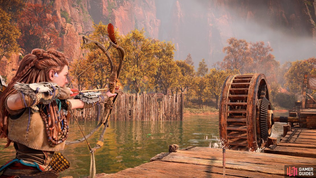 Aloy trying out her new Fire Hunter Bow.