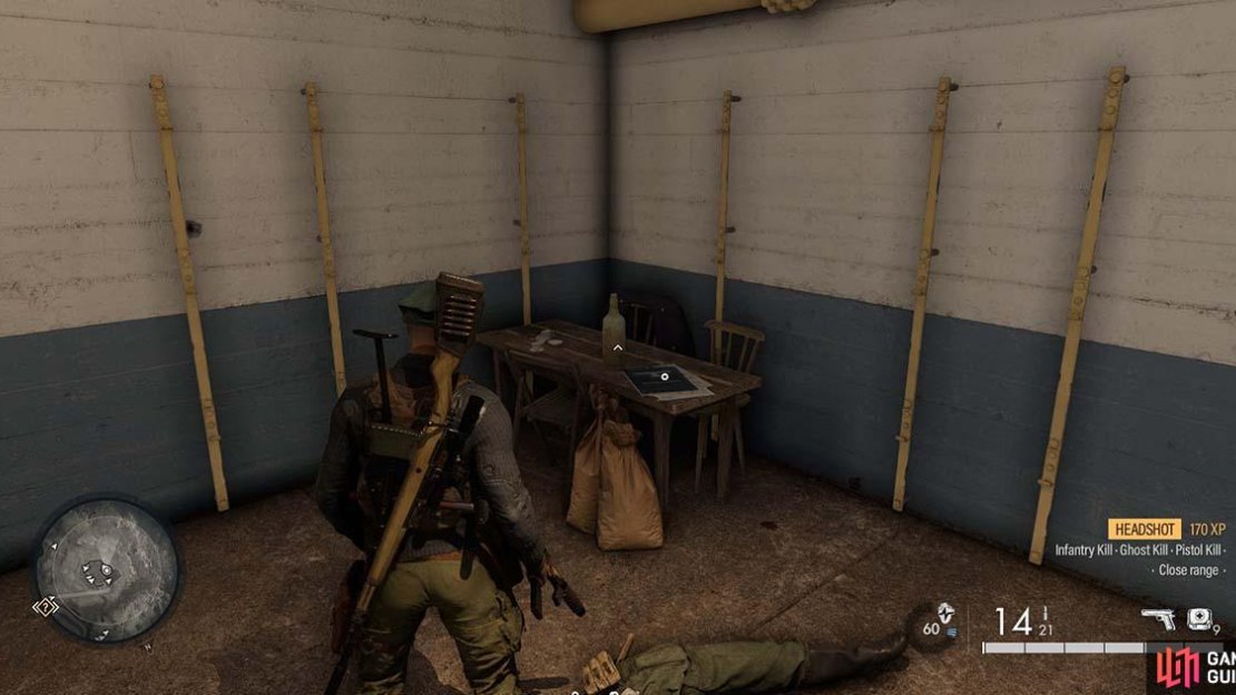 The document can be found on this table inside the bunker.