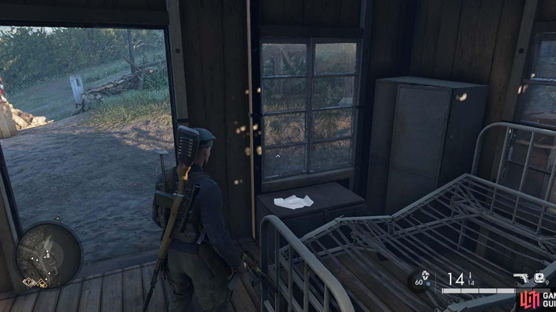 The letter can be found on a table within the building.