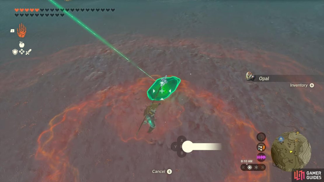 Picking up the crystal ready for returning and unlocking the shrine.