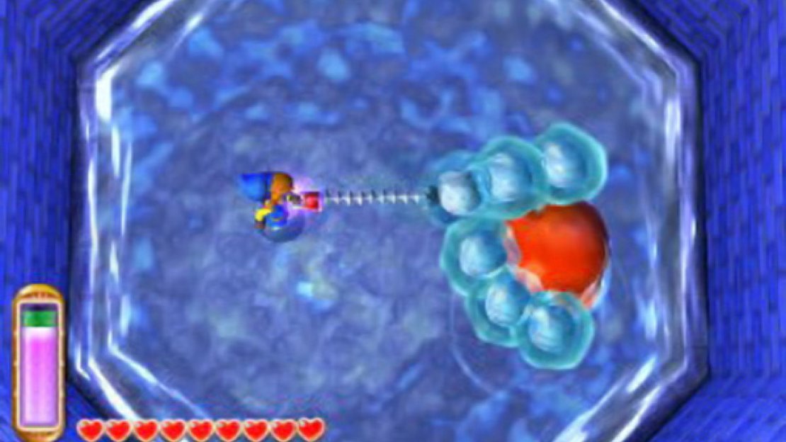 To begin with, the boss will surround itself with small jelly-like eyes. Have your hookshot ready; stand a good distance from the boss and fire the hookshot to pull an eye away and then hack at it. The eyes you hookshot off will try to return to the boss, so it’s a good idea to stay distant, leaving them with a longer journey back.
