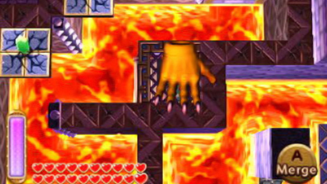 Let the hand slam the button for you to drop the barrier that’s in your way.
