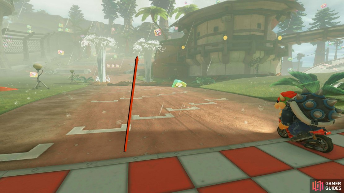 Follow the road past the geysers and ramps until you reach the food truck.