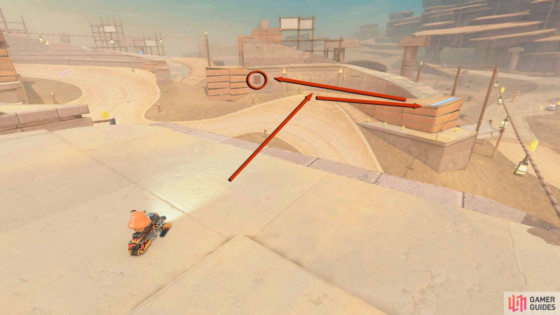 Go across the track to the panel, go near the ramp for a run-up, and then charge-jump and wall-ride to reach the panel.