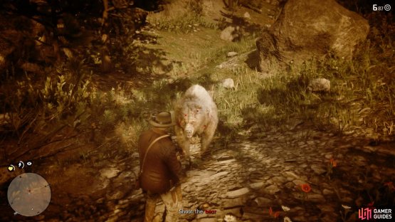you’ll need to register at least 6 shots on the bear during the attack for the Gold Medal.