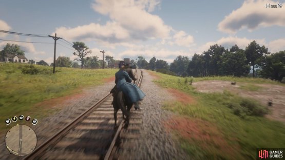Head along the tracks to reach the station quicker than following the marker