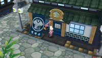 053: Left of the apparel shop entrance.
