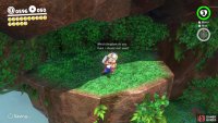 On the ledge below the white cube is Captain Toad, who will hand over a Moon if you talk to him