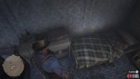 It&rsquo;s on the shelf below the top on the table next to the bed
