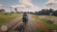 Head along the tracks to reach the station quicker than following the marker