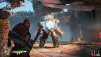 Throw the axe at the exposed core to deal damage.
