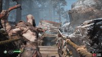 The reticle will change color to a light blue when you’re aiming at something the axe can be used on.