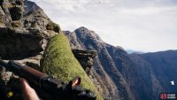 carefully cross the two logs before reaching a grapple point to the summit