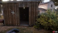 The key for the locked door is in this marked shed