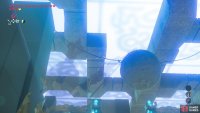 Shoot the left rope to make the boulder swing into the button