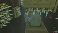 Wait for the side pillars to retract, then go around the side of the cube.
