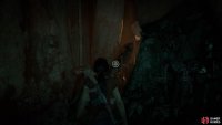 Pull the skeleton from the wall to find a way through