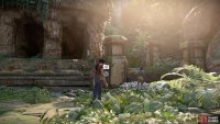 Stand by the pillar in front of the ruin and wait