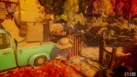 Use the rake to clear the leaves beside the car so that you can place the box in the back.