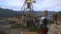 Go to Sir Robard and wait with him as the men load the trebuchet.