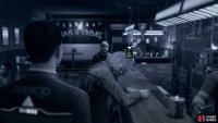 Hank is sitting at the bar