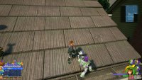 Look on the side of the roof facing the street for this Lucky Emblem