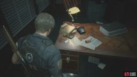 once inside head over to the northwest section of the room where you’ll see a desk, interact with it to receive the first hidden treasure, 