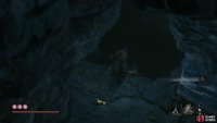 Drop down to the left of the pillar