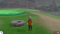 When you reach the next den, face south-east towards the hill.