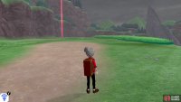 At the top of the hill, go through the tall grass on the right.